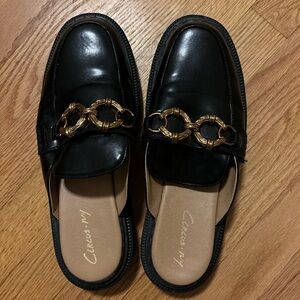 Loafers with gold accents